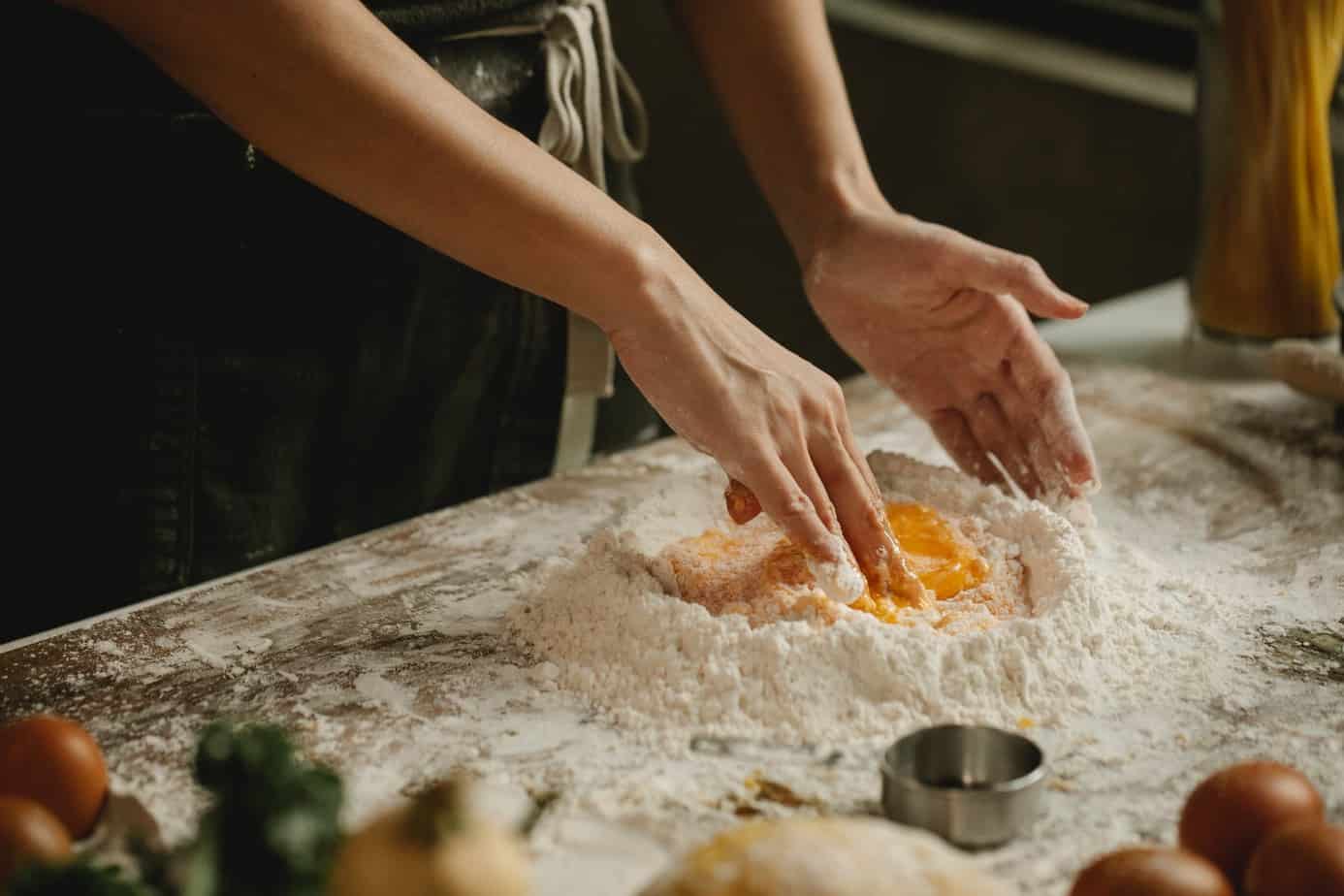 woman making pastry in bakery